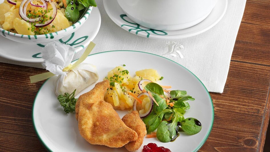 Backhenderl | Mayer mit Hut | © TAUROA GmbH Backhenderl | © TAUROA GmbH