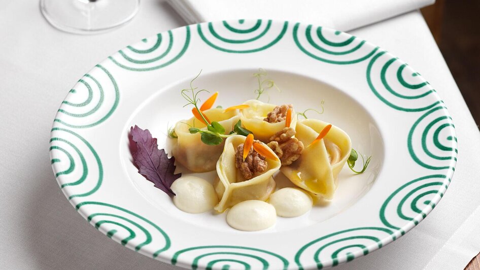 Kürbistorteloni | Mayer mit Hut | © TAUROA GmbH Kürbistorteloni | © TAUROA GmbH