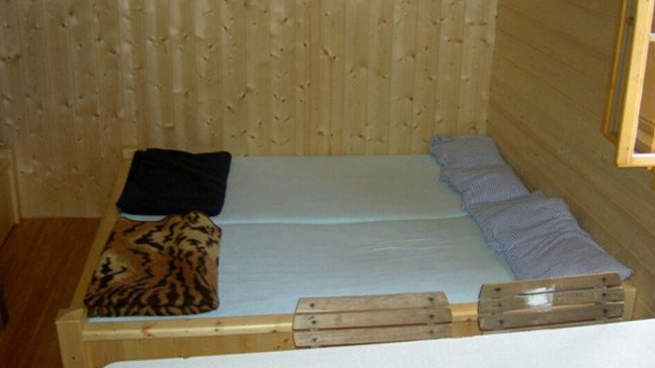 Hennaralmhütte, Grundlsee, Bett | © Naturfreunde Bad Aussee