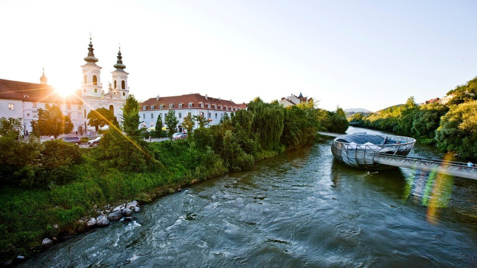Murinsel Café - Abendstimmung an der Mur | © Steiermark Tourismus - ikarus