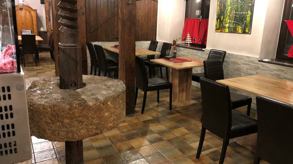 Pizzeria Heuboden mit urig und modernem Ambiente | © Pizzeria Heuboden