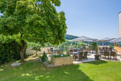 Loggia mit Gartenausblick