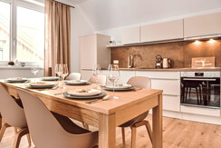 Alm Lodge A13_Tauplitz_Küche, Essbereich