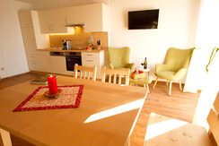 AlmdorfTonnerhuette_AppartementFedernelke_Wohnkuec