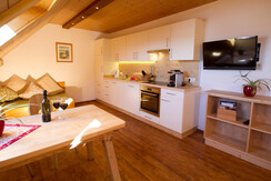 Almdorf_Tonnerhuette_AppKuhschelleWohnküche1_(C)Al