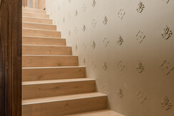 Staircase with vintage wallpaper