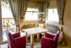 built-in banquette with snuggly sheepskin throws
