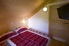 One cozy double room which includes a LED-TV