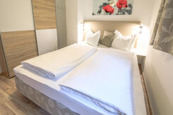 Bedroom 2 with double bed and TV