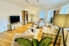 Am Hofacker Wohnbereich mit Fernseher