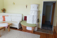 Ferienwohnung Szöky, Wohnzimmer mit Kamin