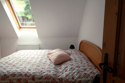 Apartment Rosegg - bedroom with double bed
