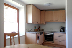 Kellerstöckl - kitchen with dining table