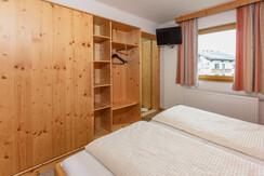 App. Orange bedroom with bathroom view