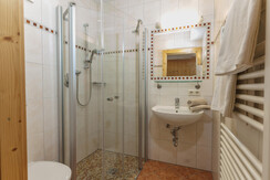 App. Blue bathroom with shower