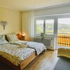 Bild von Doppelbett Zimmer mit See Blick