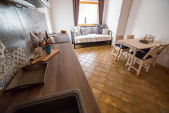 Wohnzimmer mit Küche