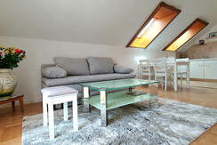 Wohnzimmer mit Küche