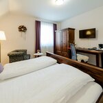 Photo of Twin room, shower, toilet, ground floor | © Region Graz-Mias Photoart