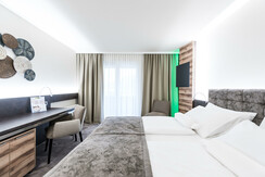 Doppelzimmer Deluxe + mit Balkon