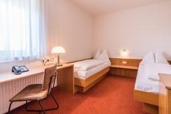 Doppelzimmer mit getrennten Betten