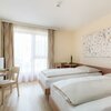 Photo of S, Triple room, shower, toilet, 1 bed room | © JUFA Hotel Stubenbergsee