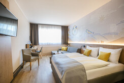 doppelzimmer-doppelbett-jufa-hotel-weiz