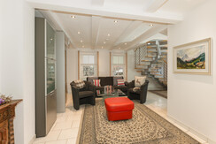 Living room with stairs to the upper floor - nickel