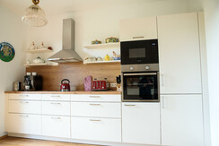 Modern, bright kitchen with access to the garden