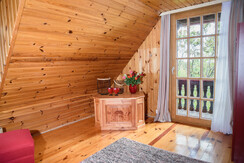 Small room upstairs with a view of the balcony