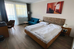 Doppelzimmer Business+, mit Balkon