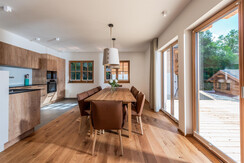 kitchen and living rooms with panoramic glass front and access to the terrace