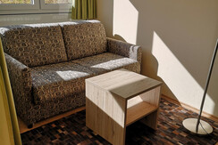 Sitzecke Dreibettzimmer