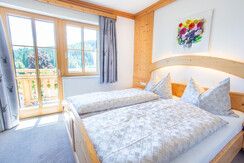 Schlafzimmer mit Balkon