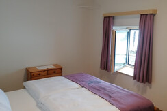 Wiesenwohnung Schlafzimmer Ost