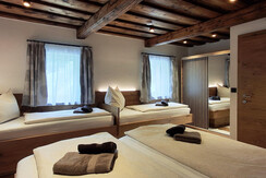 Bedroom with four beds