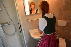 bathroom with toilet and shower