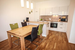 Top 2 - Dining table and kitchen