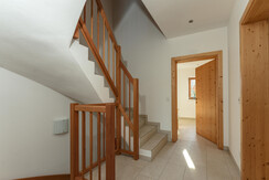 Staircase with access to the living room