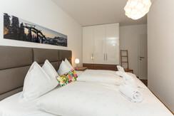 Bedroom 1 with double bed and TV