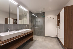 Bathroom with double wash basin and shower