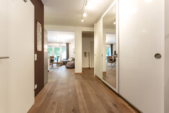 View from the entrance area to the open living kitchen