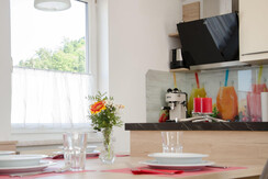 Kitchen with coffee machine
