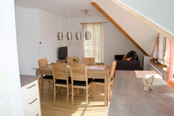 Dining table with sloping roof