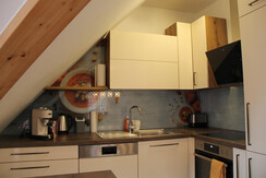 Kitchen with coffee machine