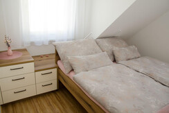 Double bed in the sloping roof