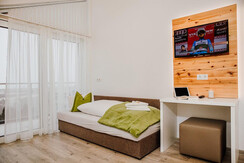 Einzelbett für 3. Person ist im Schlafzimmer 1