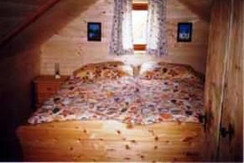 Schlafzimmer Holzknechthütte