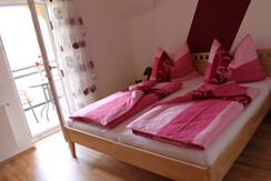 Schlafzimmer mit Balkon