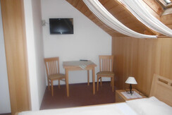 Sitzecke Doppelbettzimmer